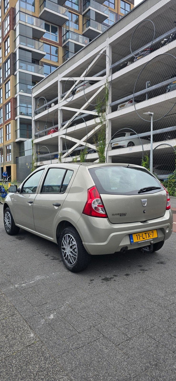 Dacia Sandero 1.2 16V 2010 Grijs, Auto's, Voorwielaandrijving, 74 pk, 31 €/maand, Origineel Nederlands