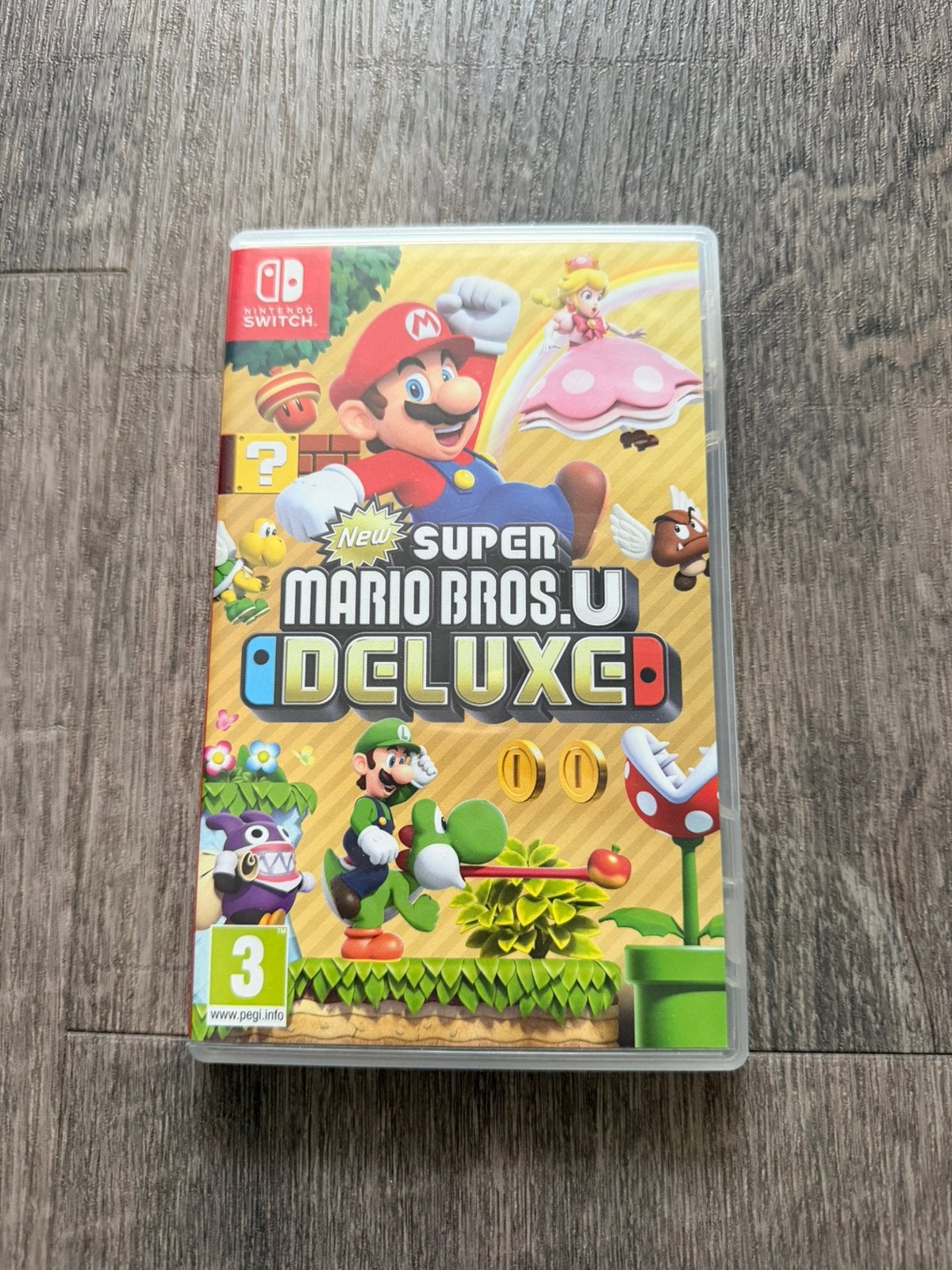 New Super Mario Bros. U Deluxe, Spelcomputers en Games, Ophalen of Verzenden, Zo goed als nieuw, Platform, 3 spelers of meer