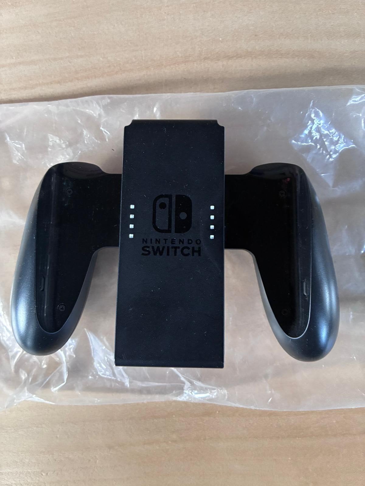 Nintendo Switch Joy-Con Grip Controller Houder, Ophalen of Verzenden, Zo goed als nieuw, Switch, Overige controllers