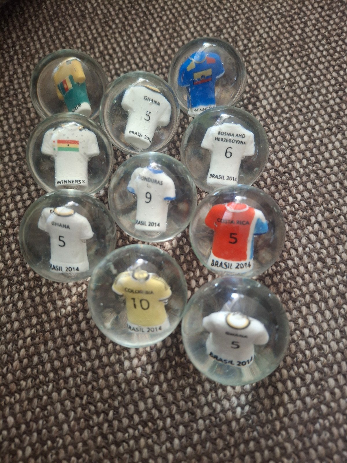 WK 2014 knikkers met voetbalshirts - diverse landen, Ophalen of Verzenden, Buitenlandse clubs