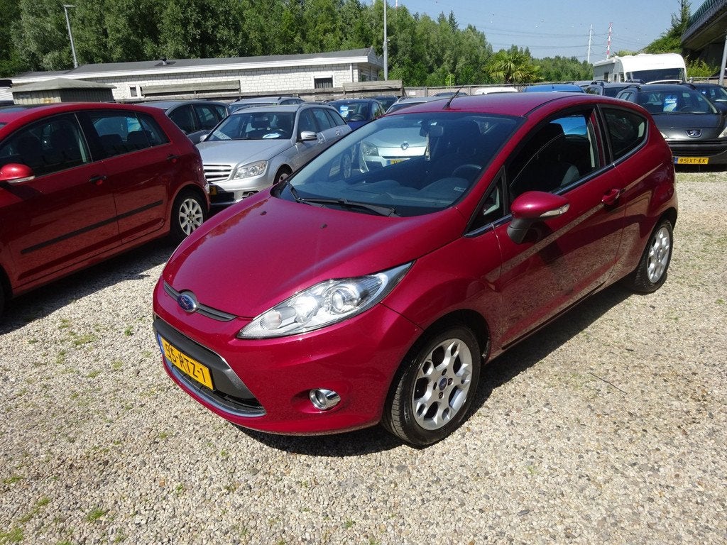 Ford Fiesta 1.25 Titanium airco sport velgen, Auto's, Voorwielaandrijving, Euro 5, Stof, Gebruikt