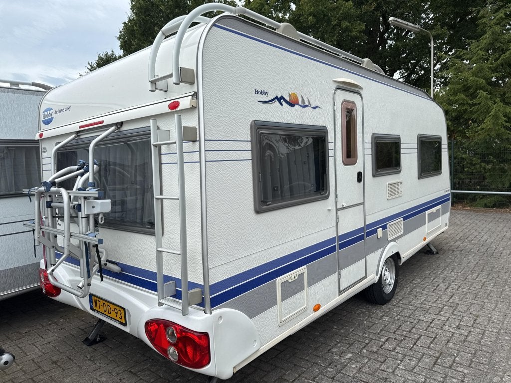 Hobby De luxe Easy 495 UL Mover/fietsdrager, Caravans en Kamperen, Caravans, Rondzit, Bedrijf, Overige typen, Tot en met 4