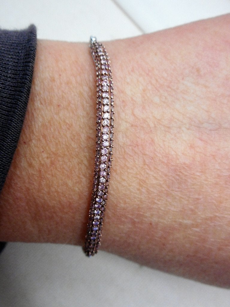 Zilveren verstelbare armband met roze steentjes nr.1724