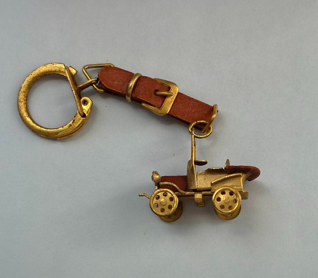 Oldtimer auto sleutelhanger, Ophalen of Verzenden, Zo goed als nieuw, Transport