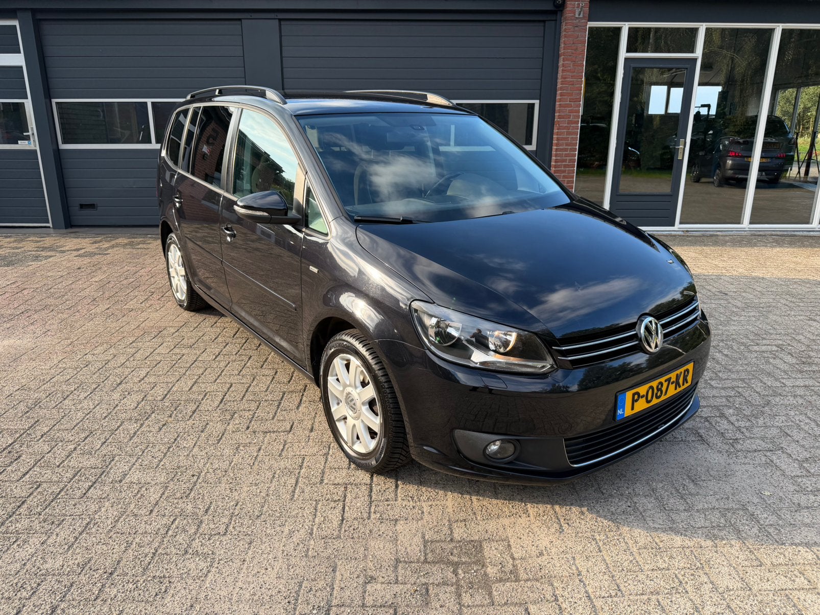 Volkswagen Touran 1.2 TSI MATCH 77KW 7-Persoons GARANTIE|PDC, Auto's, Voorwielaandrijving, Euro 5, Zwart, 4 cilinders
