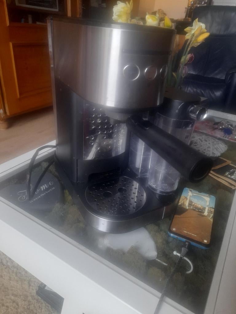 Koffiezetapparaat voor espresso en cappuccino, Ophalen