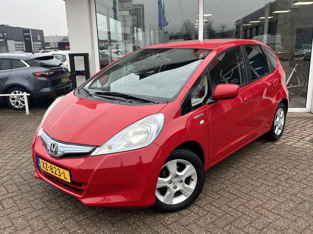 Honda Jazz 1.4 Hybrid Elegance Parkeersensoren achter, Clima, Auto's, Honda, Euro 5, Stof, Gebruikt, 4 cilinders