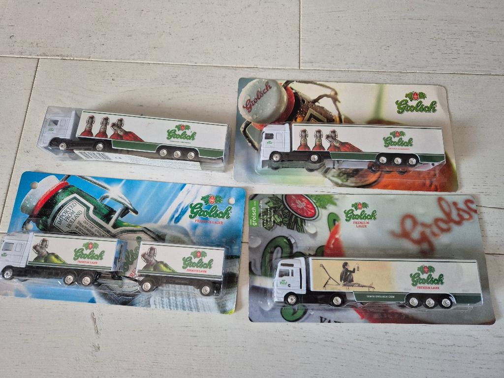Te koop: 4 Grolsch vrachtauto's/ vrachtwagens, cadeau, Ophalen of Verzenden, Nieuw, Overige typen, Grolsch