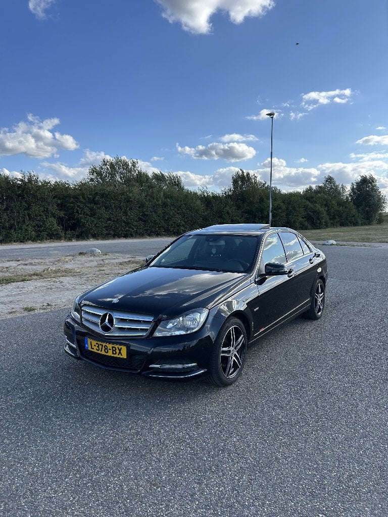 Mercedes-Benz C-Klasse C250 BE Aut7 2011 Zwart, Auto's, Mercedes-Benz, Automaat, Euro 5, 1800 kg, Zwart