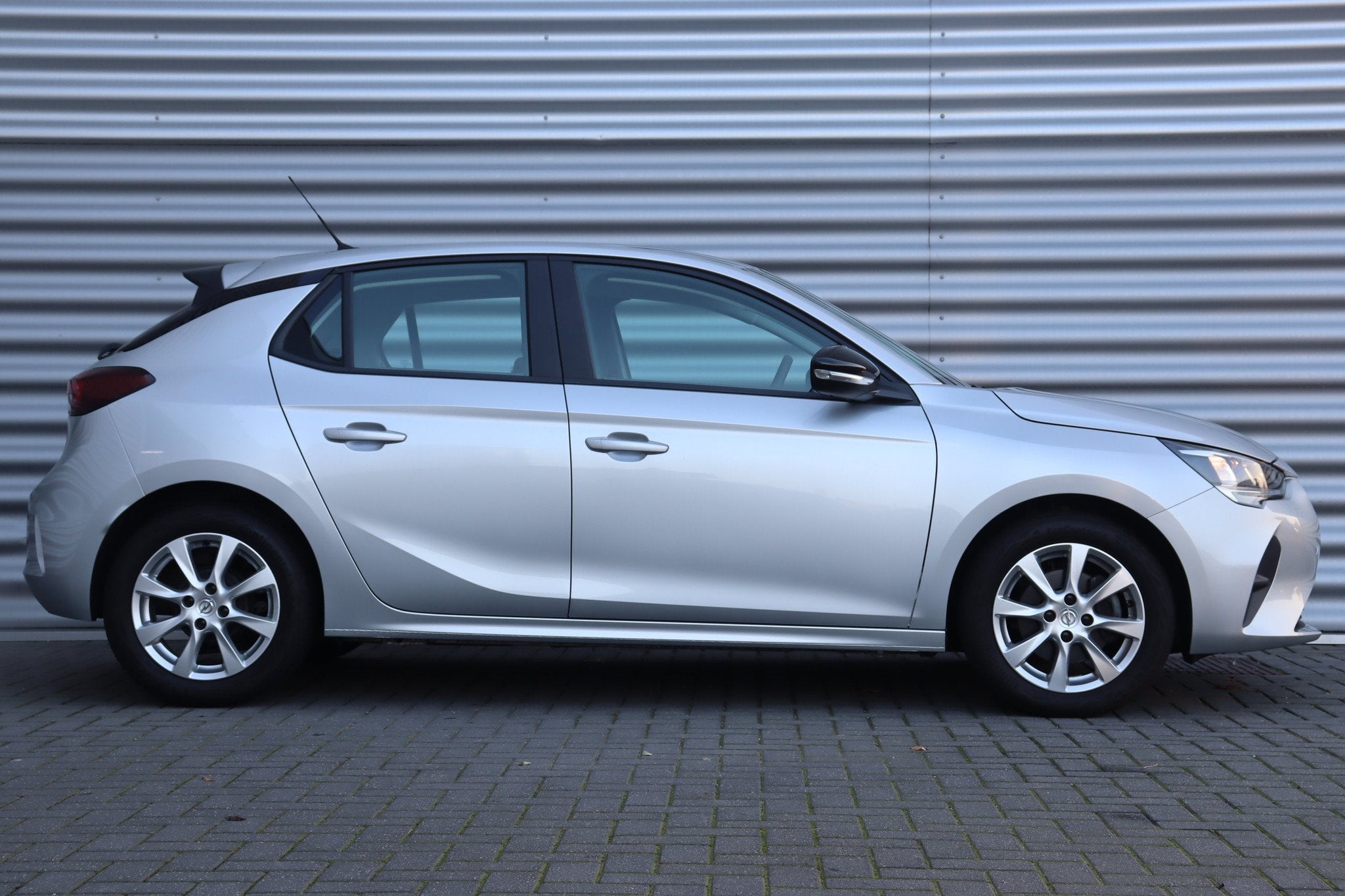 Opel Corsa 1.2 TURBO 100PK 5-DRS EDITION+, Auto's, Keurmerk '100% Onderhouden', 12 maanden, Gebruikt, Verwarmde buitenspiegels