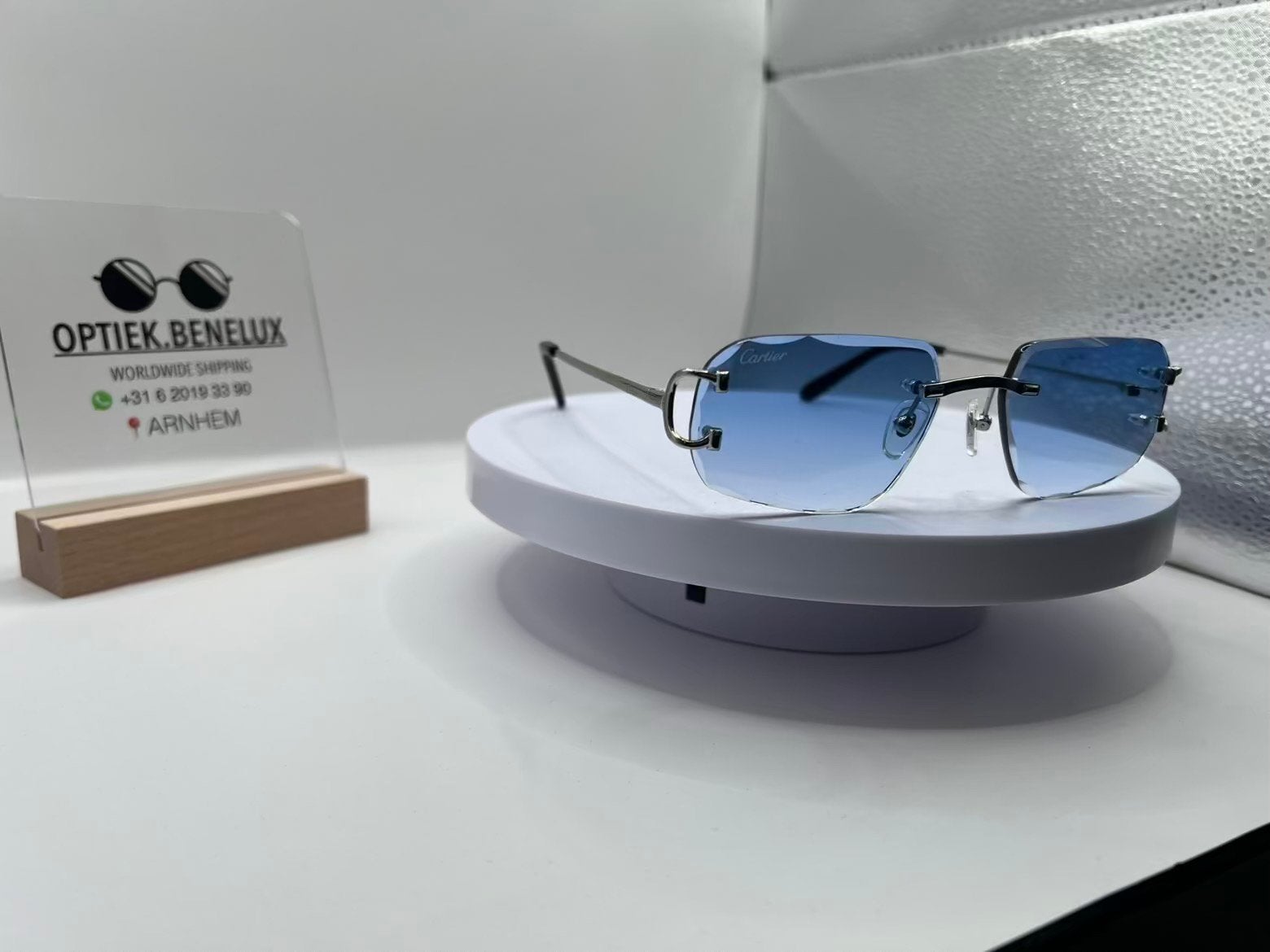 Cartier diamond cut zilver met blauwe glazen, Ophalen of Verzenden, Nieuw, Zwart, Overige merken