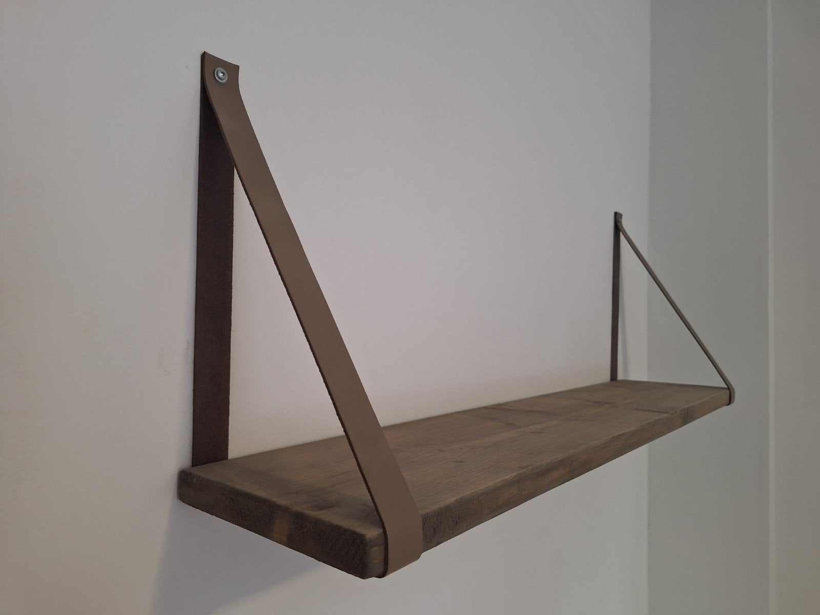 Houten wandplank met leren bruine banden, Ophalen