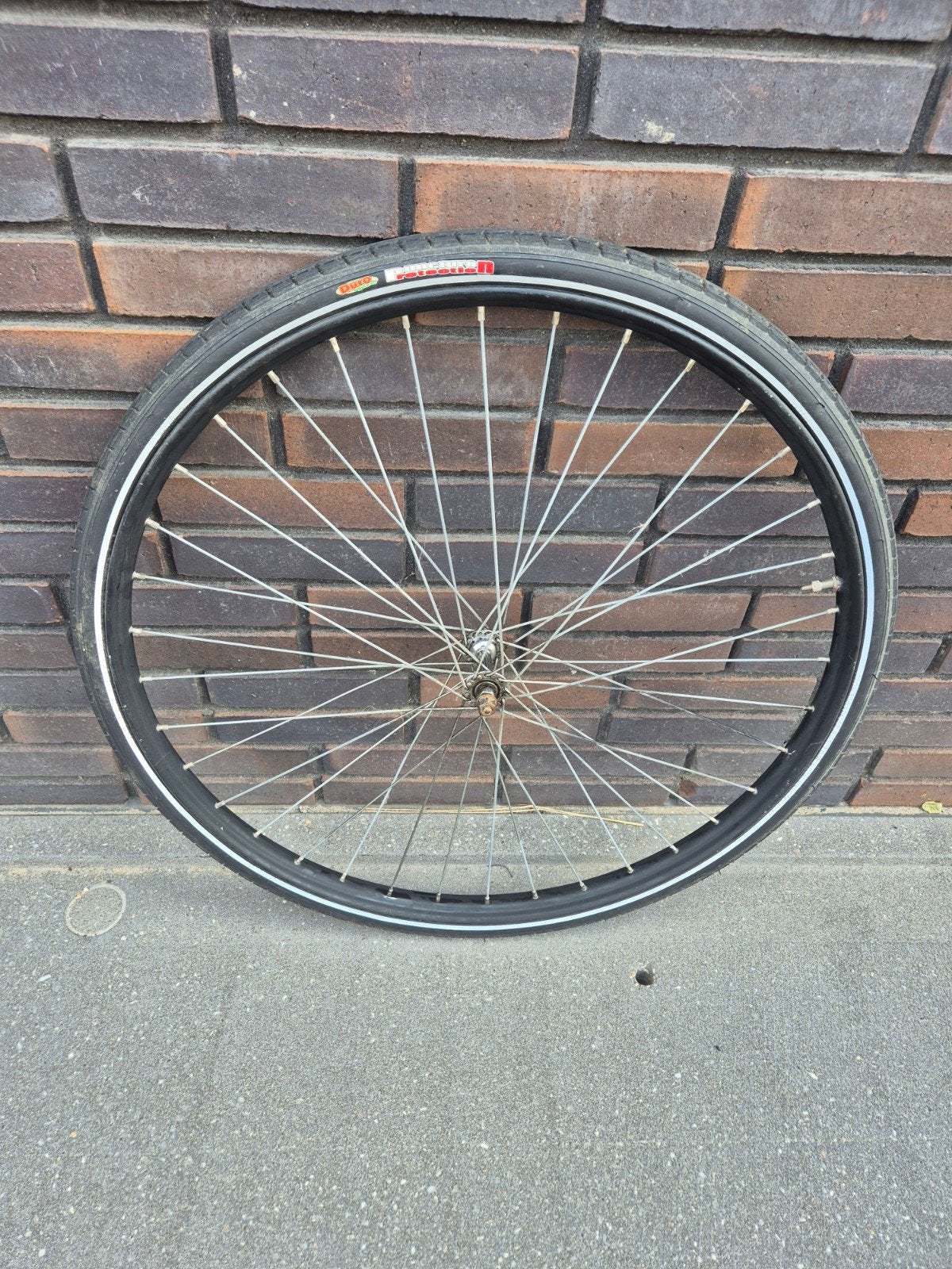 28 inch voorwiel met band voor oma/transportfiets, Fietsen en Brommers, Fietsonderdelen, Gebruikt, Staal, Stadsfiets, Ophalen
