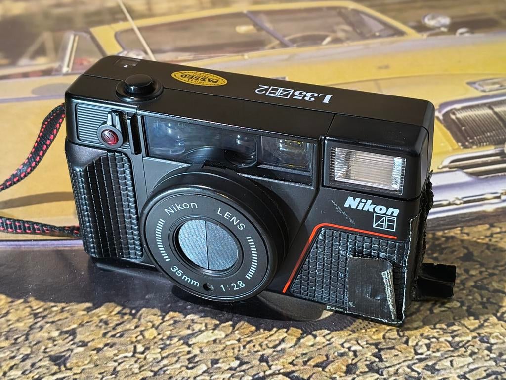 Nikon L35AF2 Compact Camera - Werkend met beschadiging, Audio, Tv en Foto, Fotocamera's Analoog, Gebruikt, Compact, Nikon, Ophalen of Verzenden