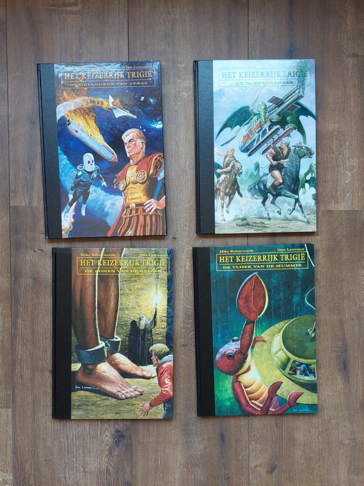 4 x hardcover Het Keizerrijk Trigie + artprints, Meerdere stripboeken, Ophalen of Verzenden, Zo goed als nieuw