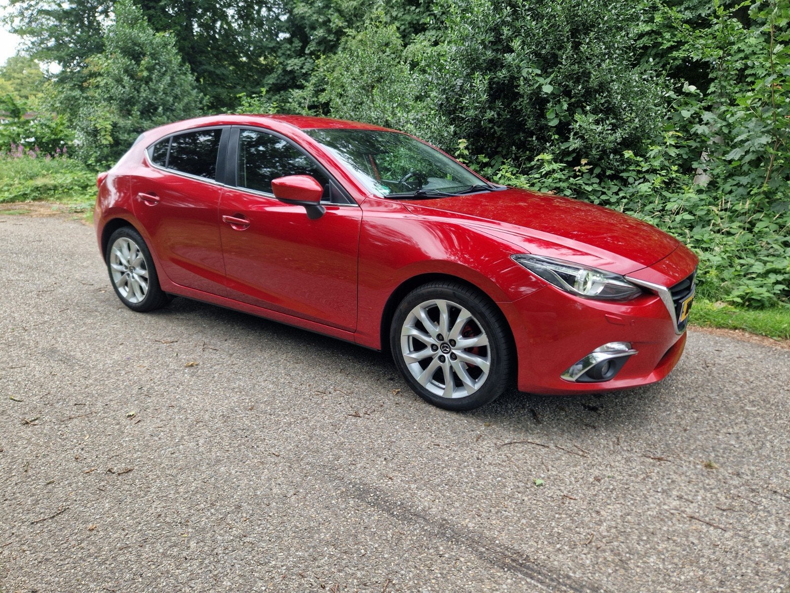 Mazda 3 1.5 Skyactiv-g 74KW HB 2014 Rood, Auto's, Voorwielaandrijving, 4 cilinders, 1165 kg, 100 pk