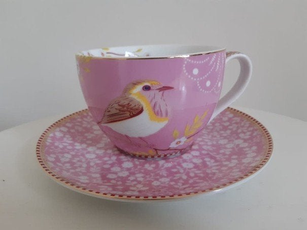 Pip Studio, kop en schotel, roze met vogel, Huis en Inrichting, Keuken | Servies, Pip Studio, Ophalen of Verzenden, Zo goed als nieuw