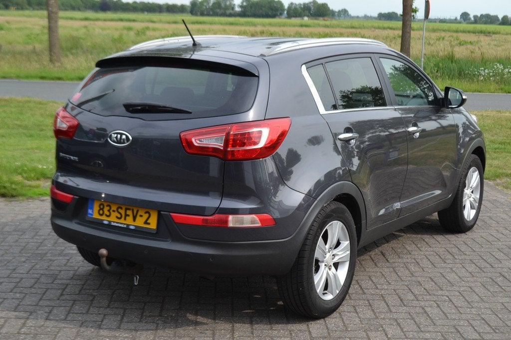 Kia Sportage 2.0 X-ecutive Plus Pack (bj 2011), Auto's, Kia, Gebruikt, Zwart, 4 cilinders, Leder en Stof