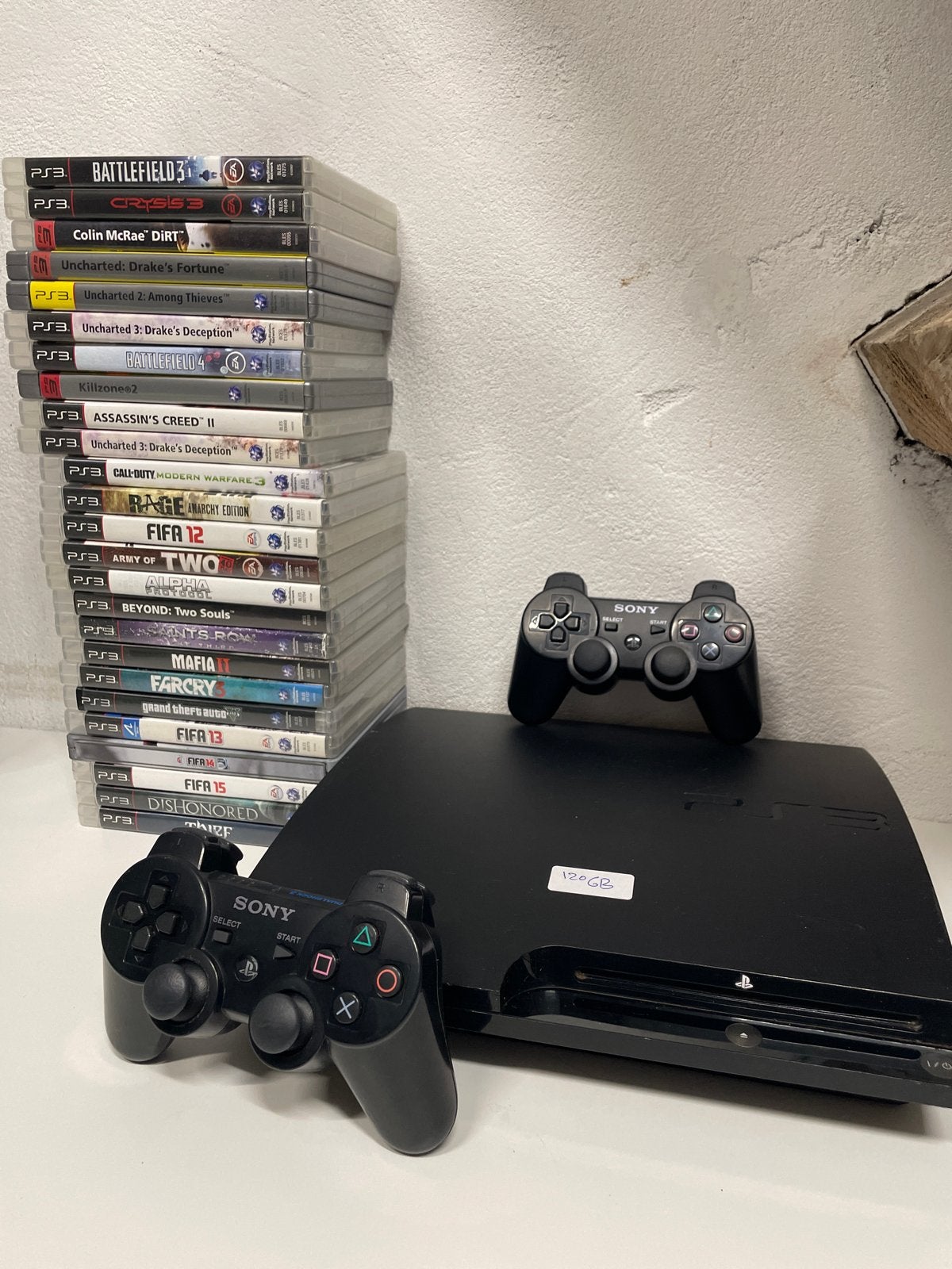 PlayStation 3 (PS3) Slim 120GB met 2 controllers en games, Met games, Met 2 controllers, Ophalen of Verzenden, Zo goed als nieuw