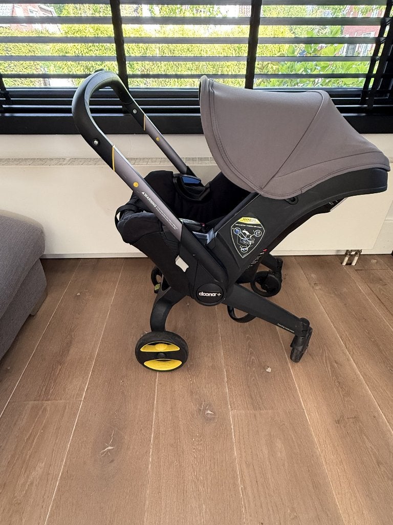 Doona+ autostoel en kinderwagen 2-in-1 grijs + accessoires, Zijbescherming, 0 t/m 13 kg, Ophalen, Overige merken