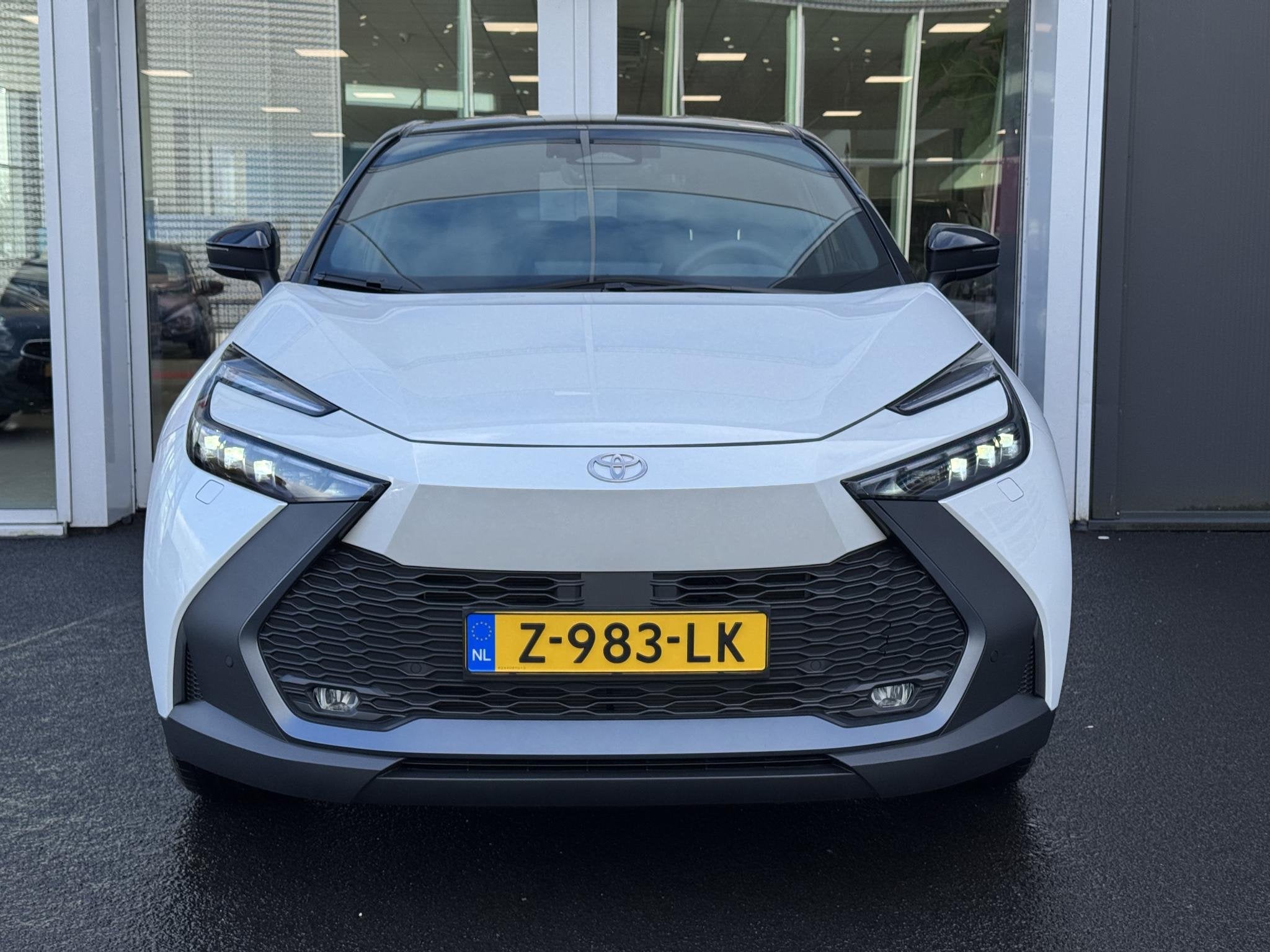 Toyota C-HR 1.8 Hybrid 140 Style Bi-Tone | Unieke tellerstan, Auto's, Stof, 4 cilinders, Wit, Origineel Nederlands