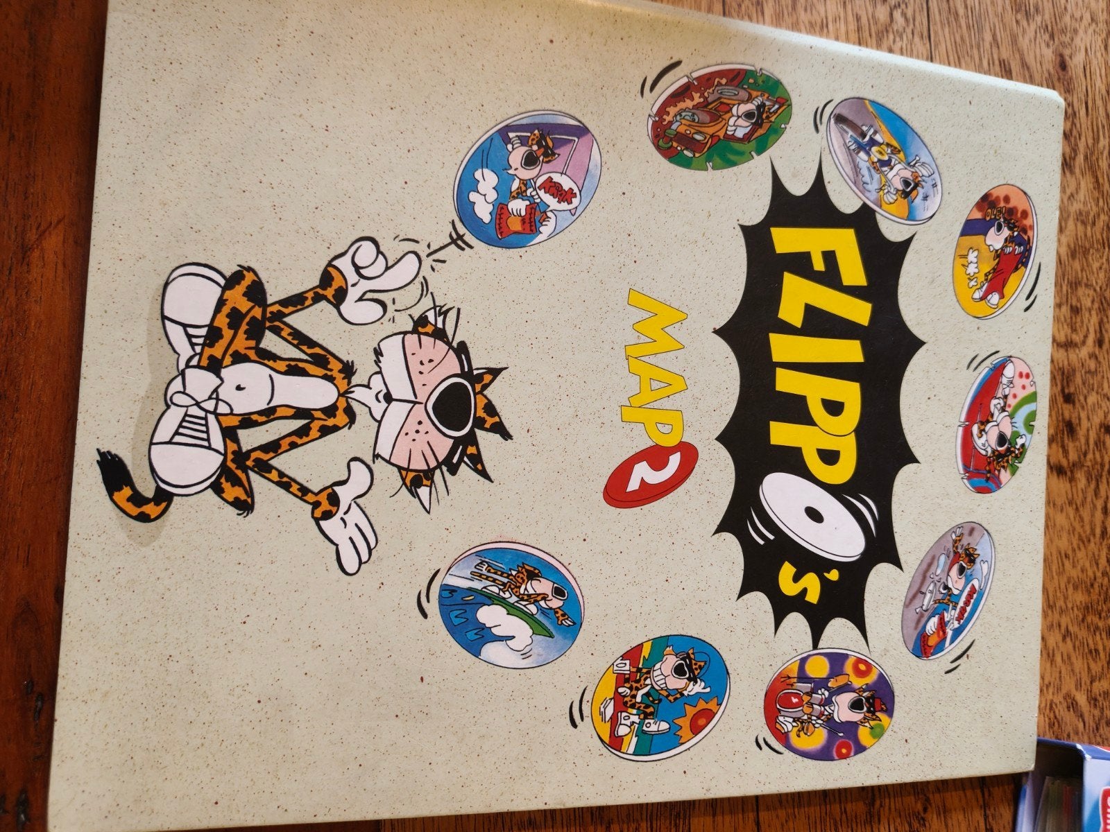 Grote verzameling Flippo's in map - Cheetos, Looney Tunes, Ophalen of Verzenden, Cheetos 24 Game, Verzameling, Met verzamelmap(pen)