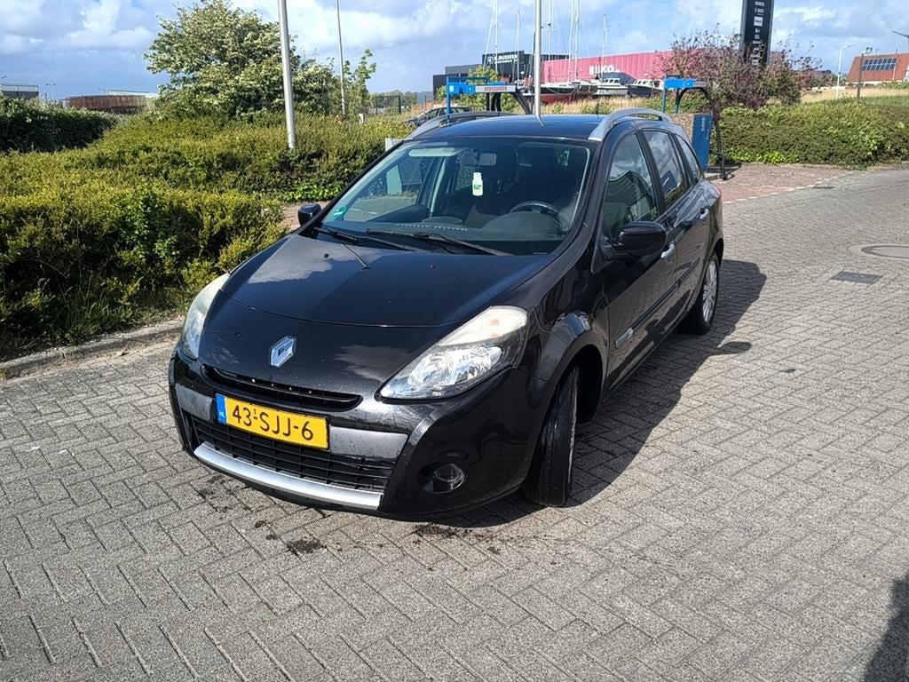Renault Clio 1.2 16V 55KW Estate 2011 Zwart, Auto's, Voorwielaandrijving, 74 pk, 4 cilinders, Origineel Nederlands