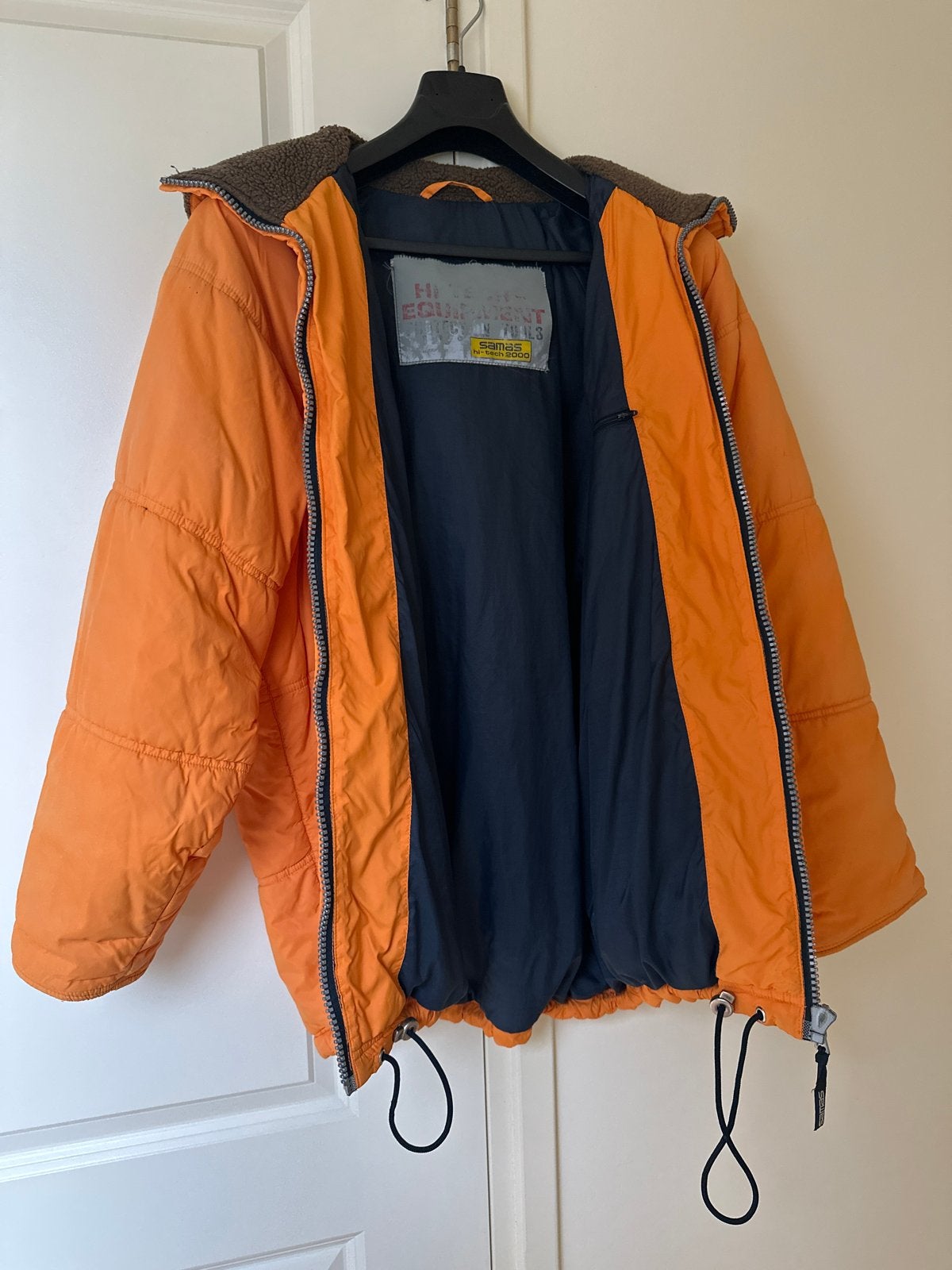 Oranje gewatteerde ski/winterjas met capuchon, maat L, Ophalen of Verzenden, Gedragen, Maat 38/40 (M), Oranje