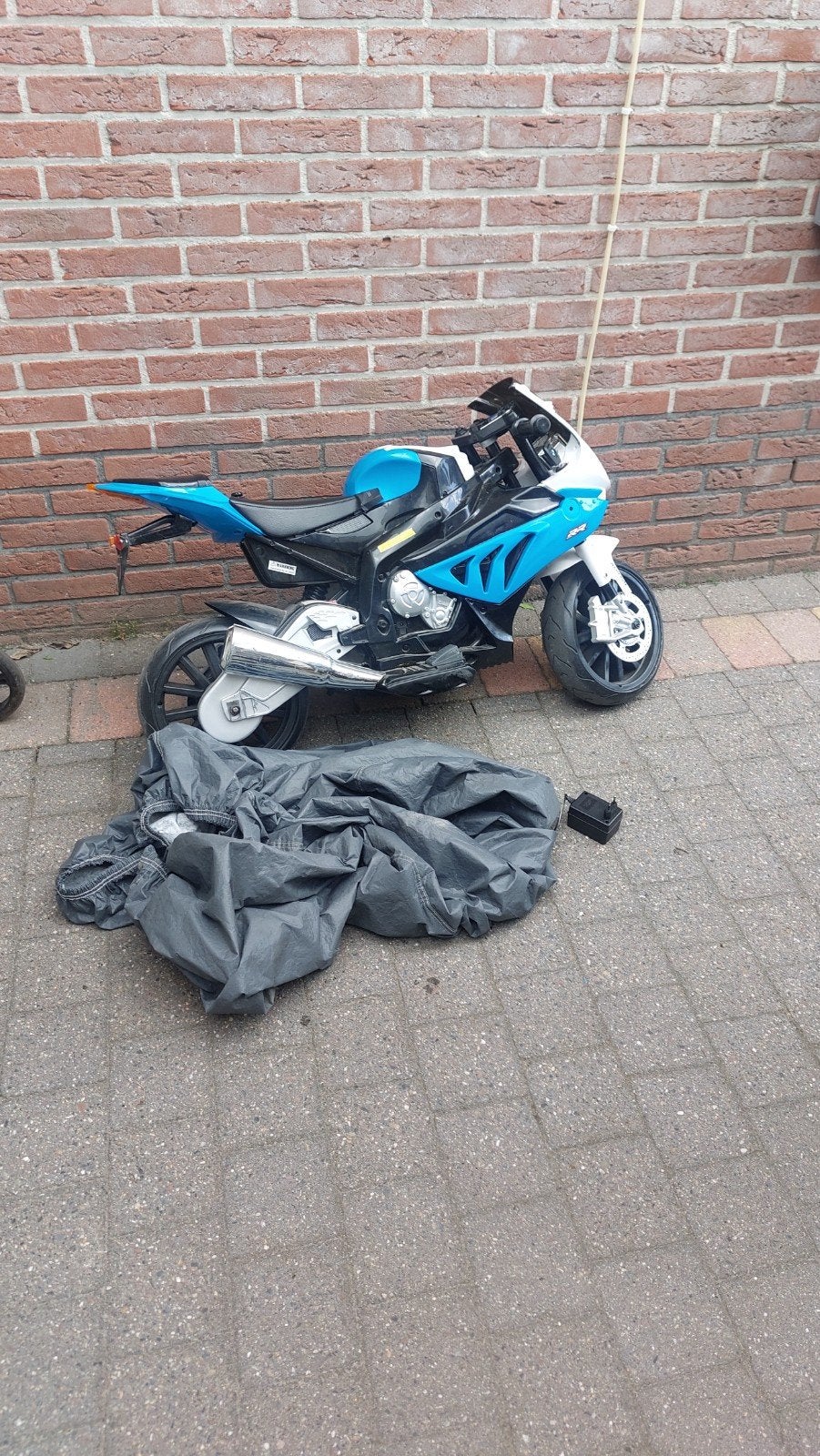 Elektrische kindermotor met hoes en lader (accu defect), Kinderen en Baby's, Speelgoed | Buiten | Voertuigen en Loopfietsen, Ophalen of Verzenden