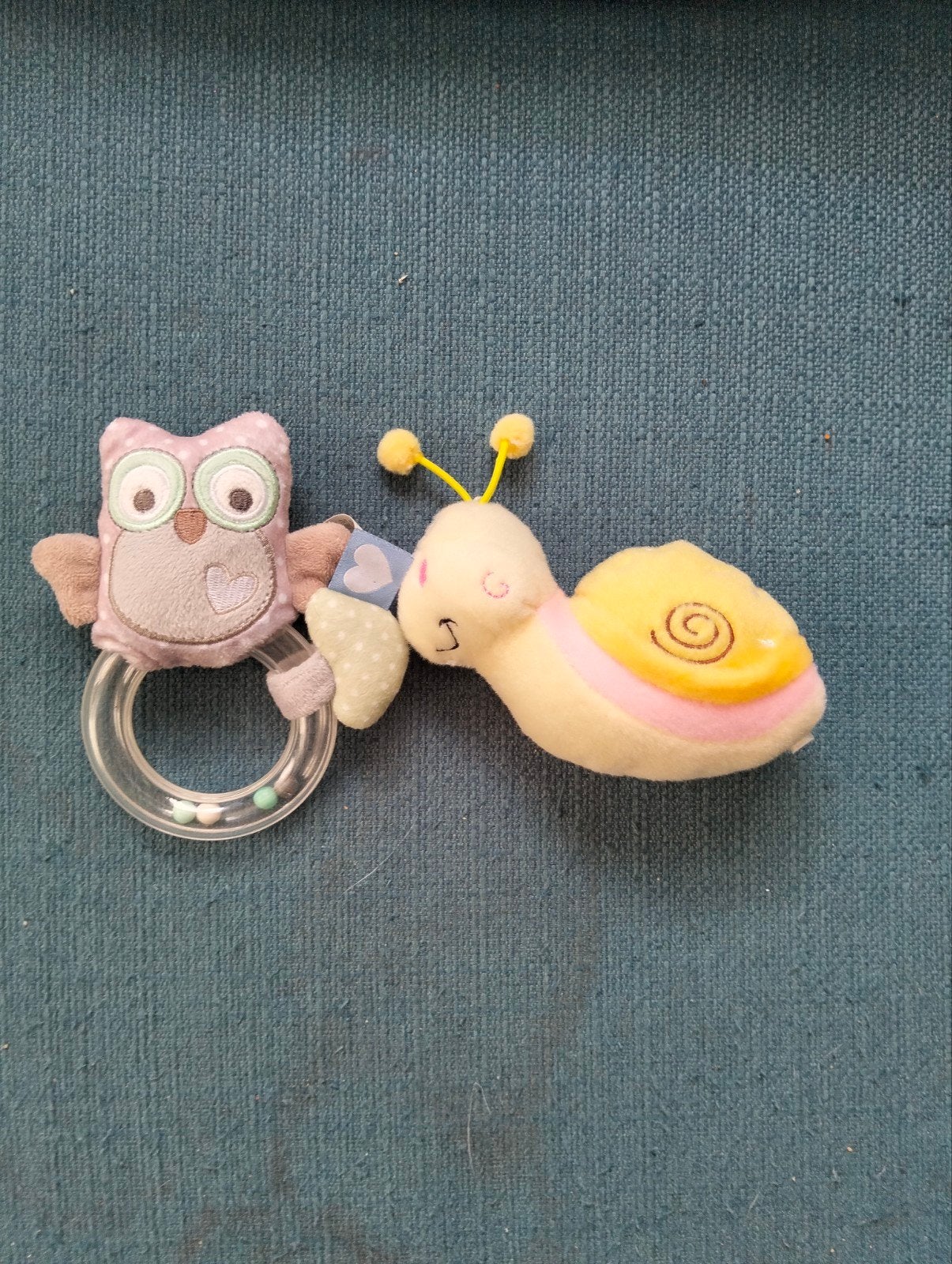 Tiamo uil rammelaar en knuffel slakje, Ophalen