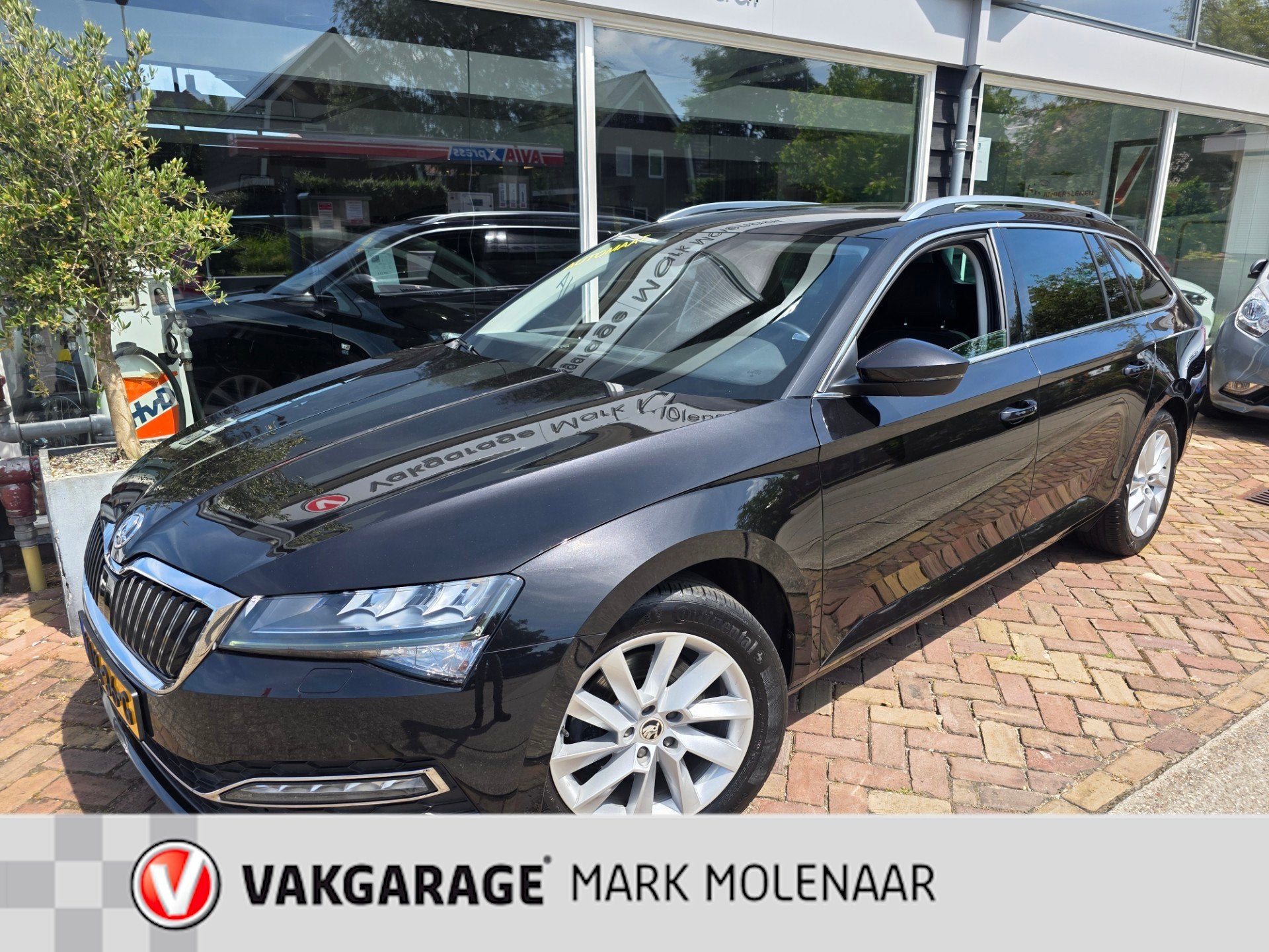 Skoda Superb Combi 1.5 TSI ACT Business Edition Plus,trekhaa, Auto's, Euro 6, 4 cilinders, 150 pk, Zwart
