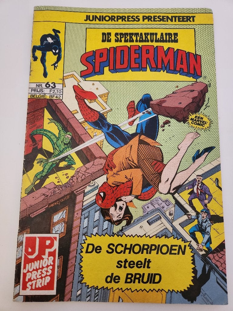 De spektakulaire Spiderman - 63 -1985, Boeken, Europa, Ophalen of Verzenden, Junior Press, Gelezen