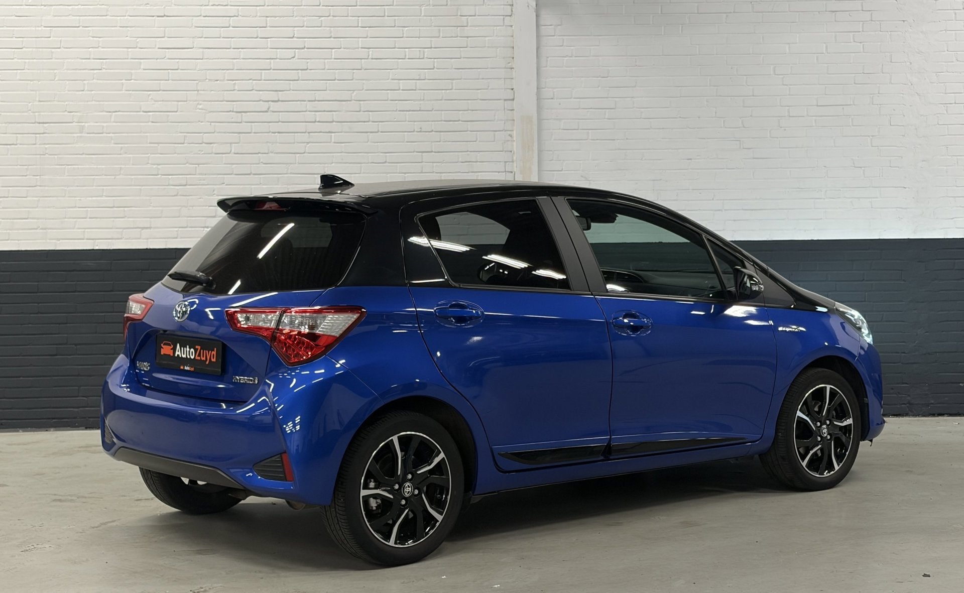 Toyota Yaris 1.5 Hybrid Y20 Automaat Navi / Climate Control, Gebruikt, 4 cilinders, Blauw, Bedrijf