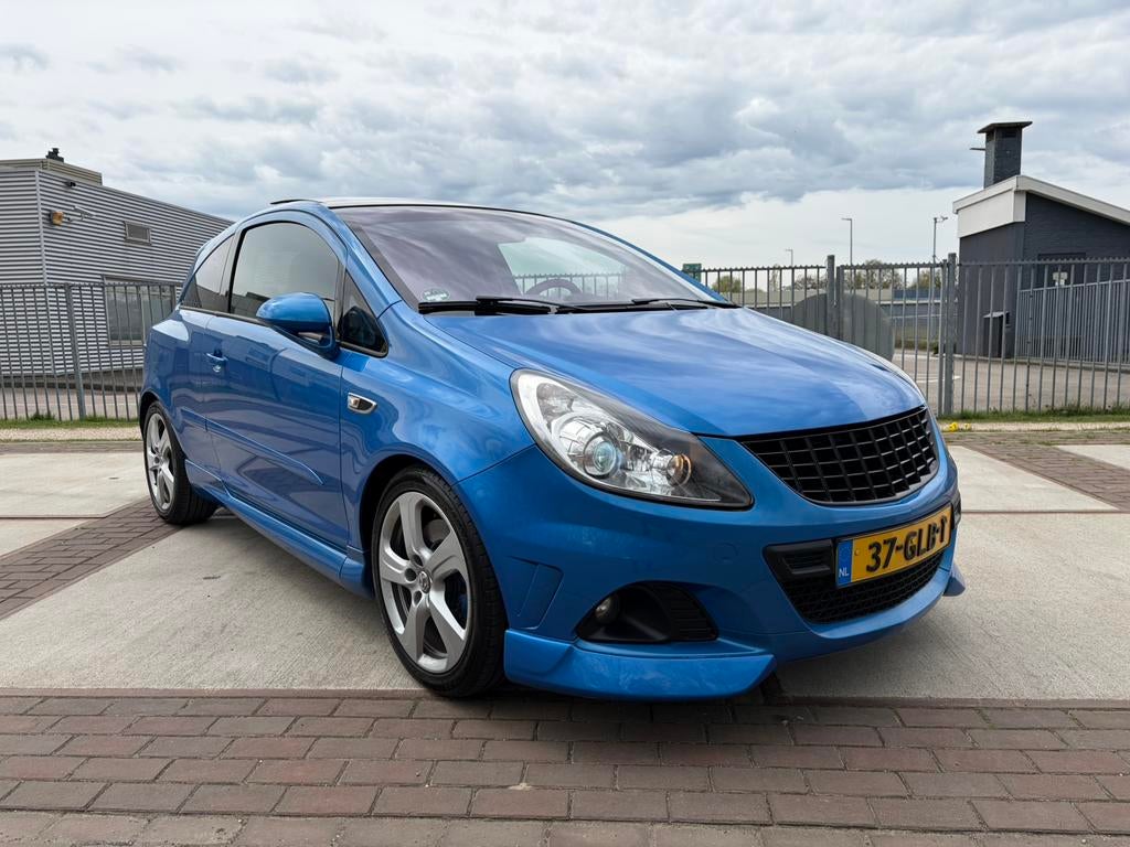 Opel Corsa D OPC met schuifkanteldak, recaro, APK 01/2027, Voorwielaandrijving, Euro 5, Zwart, Leder en Stof