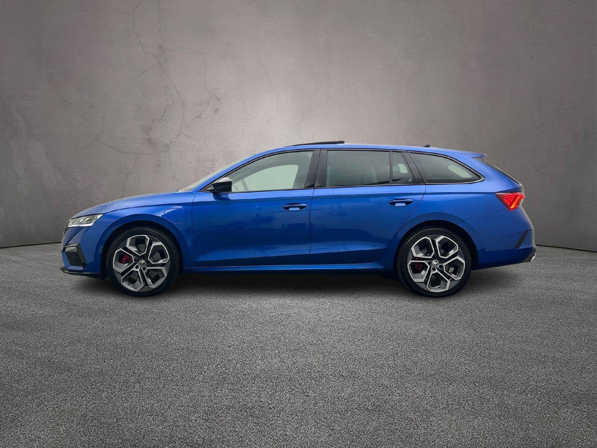 Skoda Octavia Combi RS Business 1.4 TSI PHEV 245pk DSG Autom, Auto's, Stof, Gebruikt, 4 cilinders, Blauw