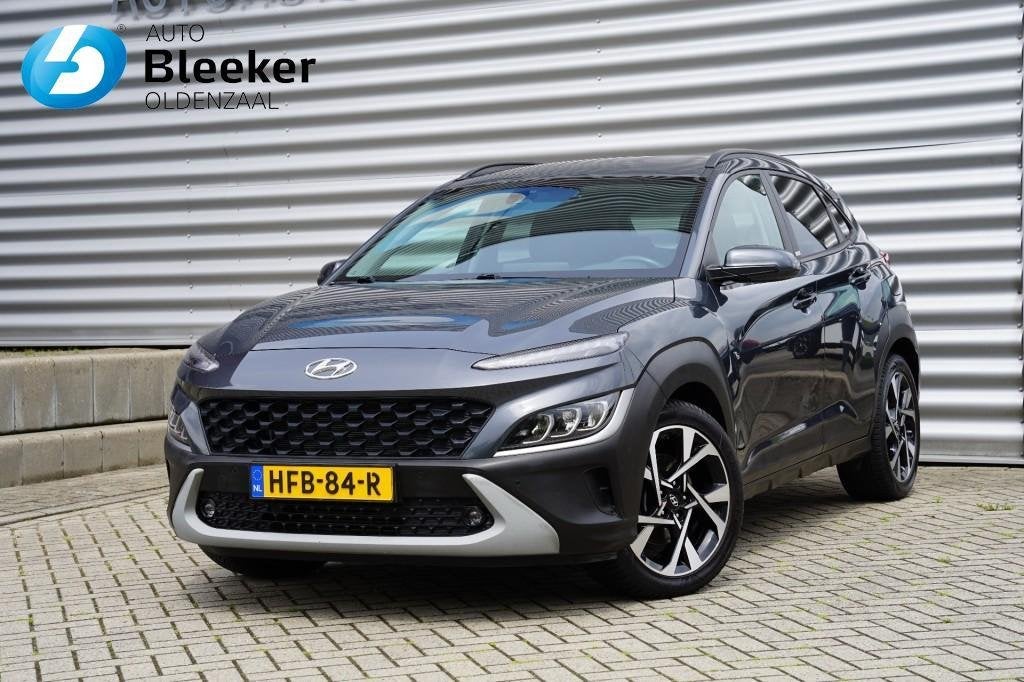 Hyundai Kona 1.0 T-GDI Fashion Ecc Navi PDC Camera Carplay, Auto's, Stof, Gebruikt, Origineel Nederlands, 1200 kg