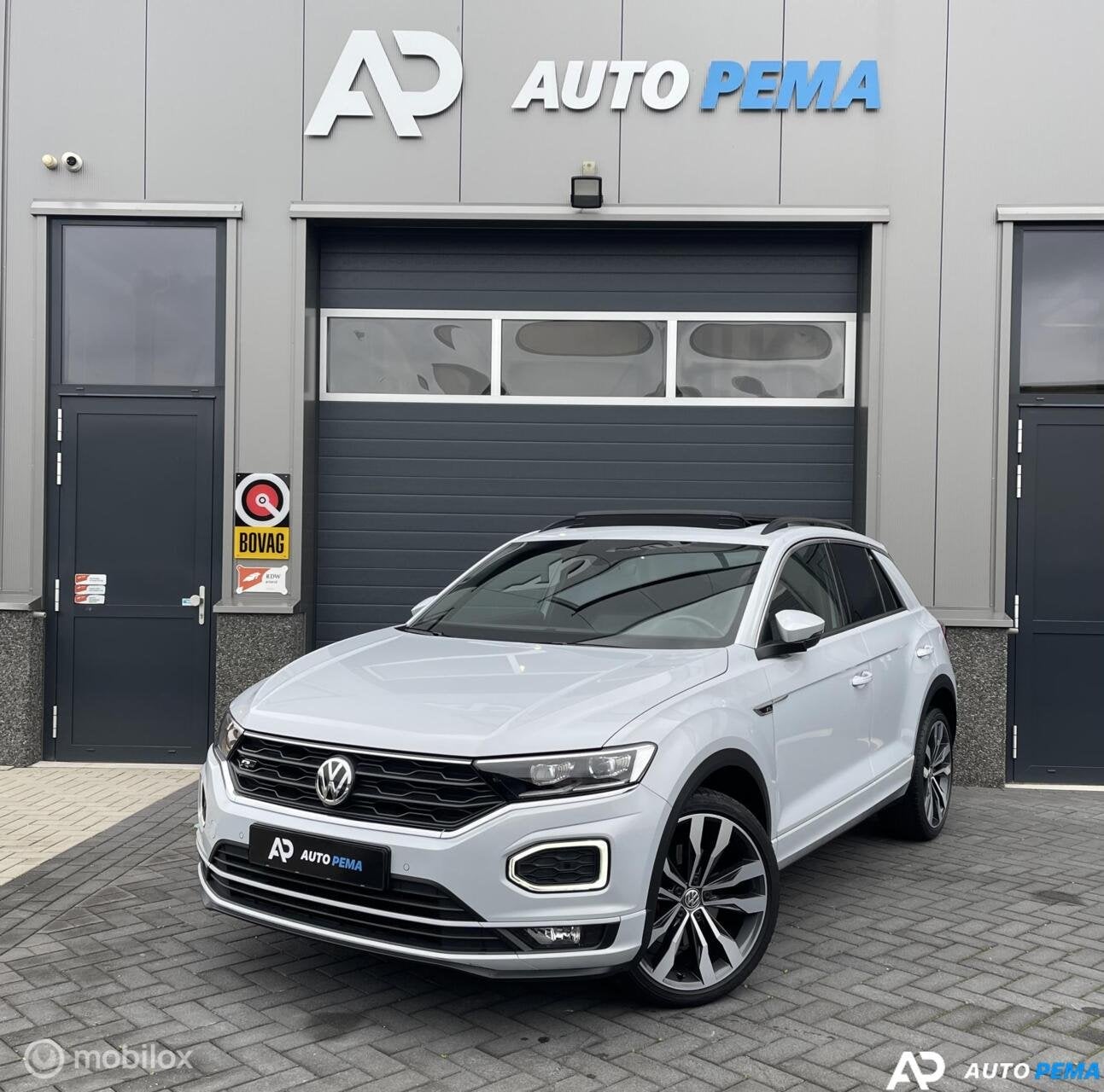 Volkswagen T-Roc 1.5 TSI DSG 3xR-Line 150PK ACC Cam, Auto's, Zwart, 4 cilinders, 150 pk, Leder en Stof