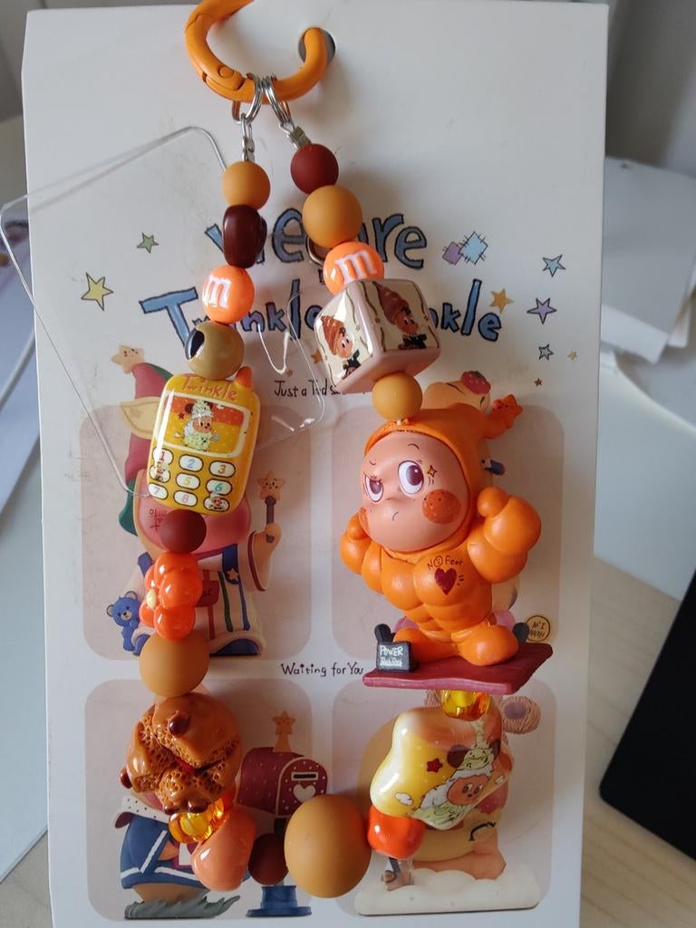 Leuke Twinkle Telefoon Bedel - Oranje Design, Telecommunicatie, Mobiele telefoons | Toebehoren en Onderdelen, Ophalen of Verzenden