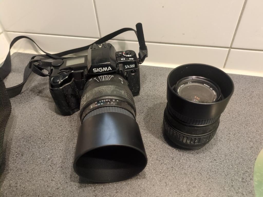 Sigma SA300 Spiegelreflexcamera met 2 lenzen, Ophalen of Verzenden, Gebruikt, Spiegelreflex, Overige Merken