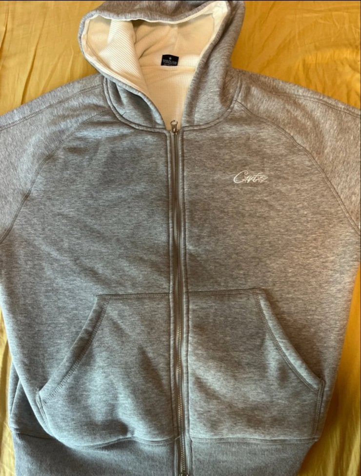 Grijze corteiz vest met rits en capuchon - Maat M, Kleding | Heren, Truien en Vesten, Ophalen of Verzenden, Gedragen, Maat 48/50 (M)