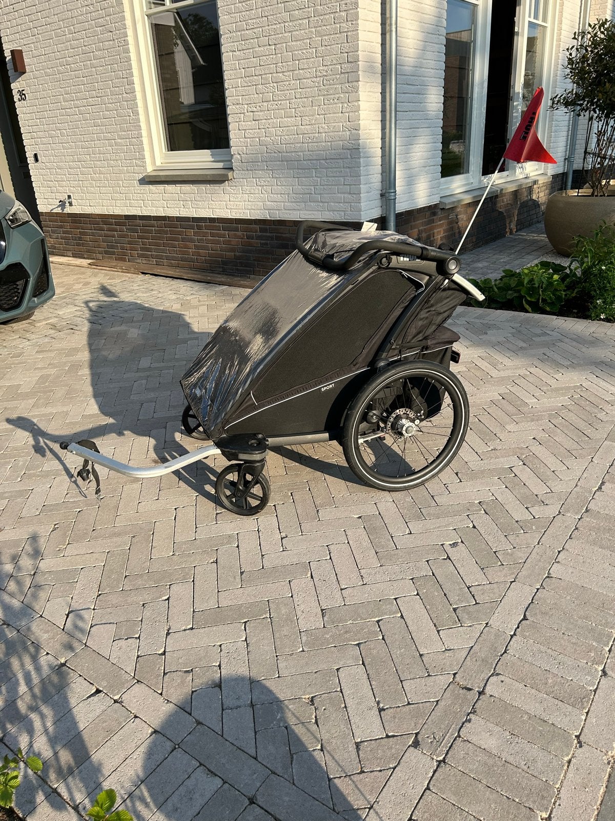 Thule Chariot Sport 2 met regenhoes en zonnescherm, Overige merken, Gebruikt, Duowagen, Ophalen of Verzenden