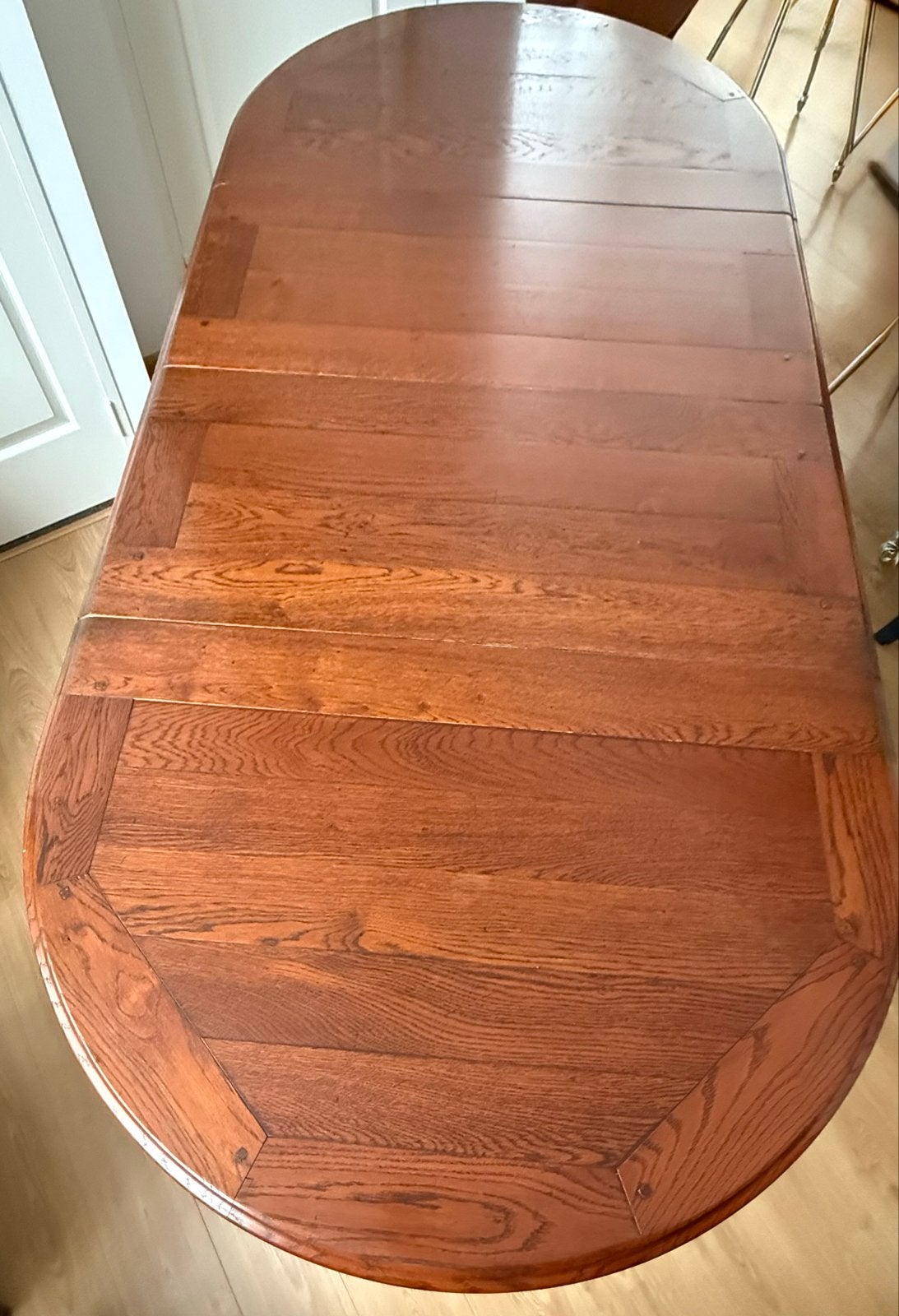 Uitschuifbare eettafel van massief hout, Ophalen