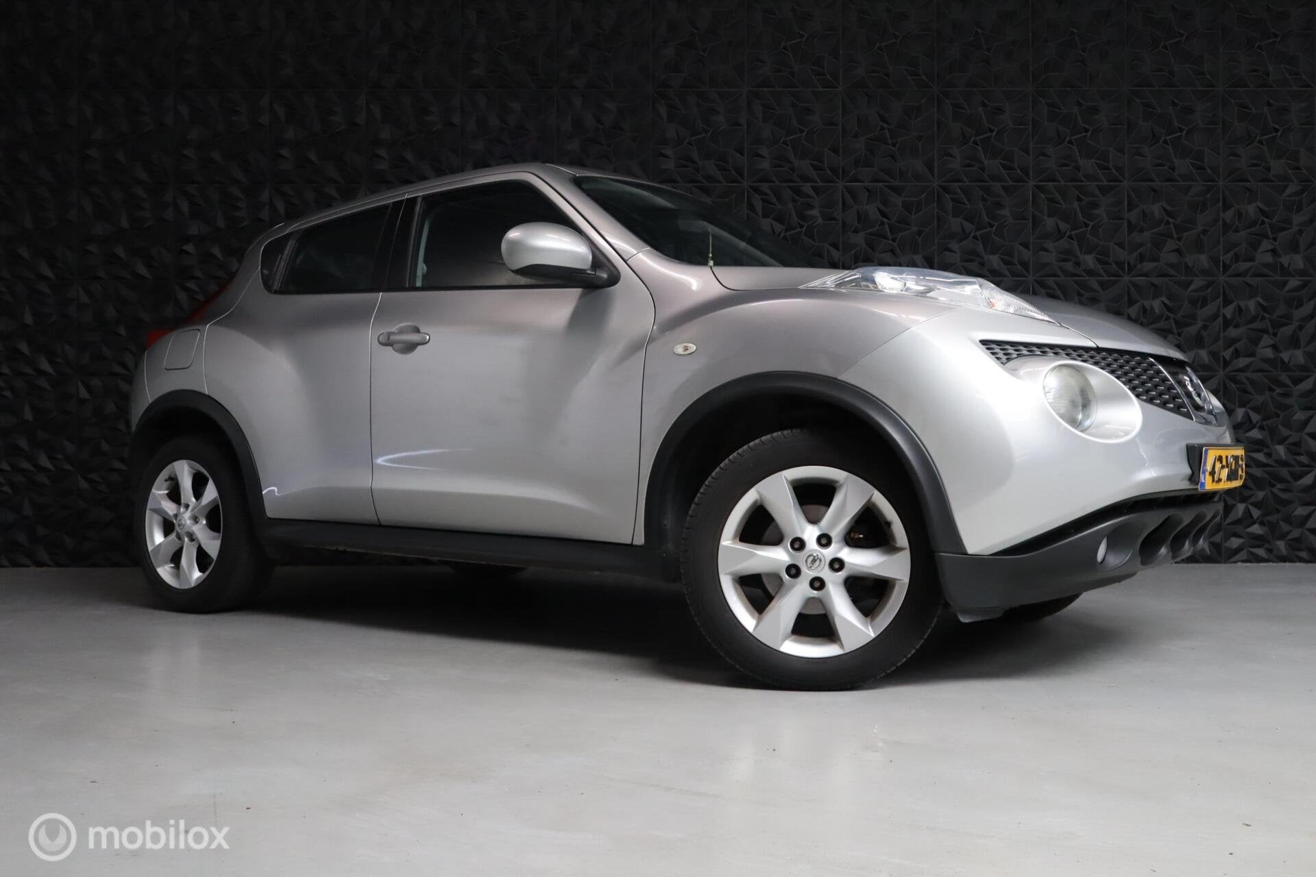 Nissan Juke 1.6 Acenta Eco | Camera | Cruise | NAV | AC | BT, Auto's, Nissan, Euro 5, 4 cilinders, 49 €/maand, Origineel Nederlands