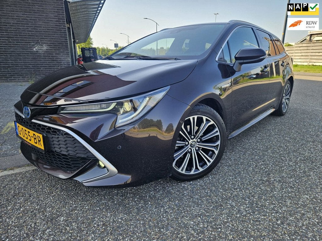 Toyota Corolla Touring Sports 1.8 Hybrid Executive GARANTIE, Auto's, Toyota, Gebruikt, 4 cilinders, Bruin, Corolla