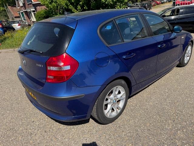 BMW 1-serie 118i Business Line Airco Cruise-control 6BAK 2ei, 1-Serie, Achterwielaandrijving, Blauw, Origineel Nederlands