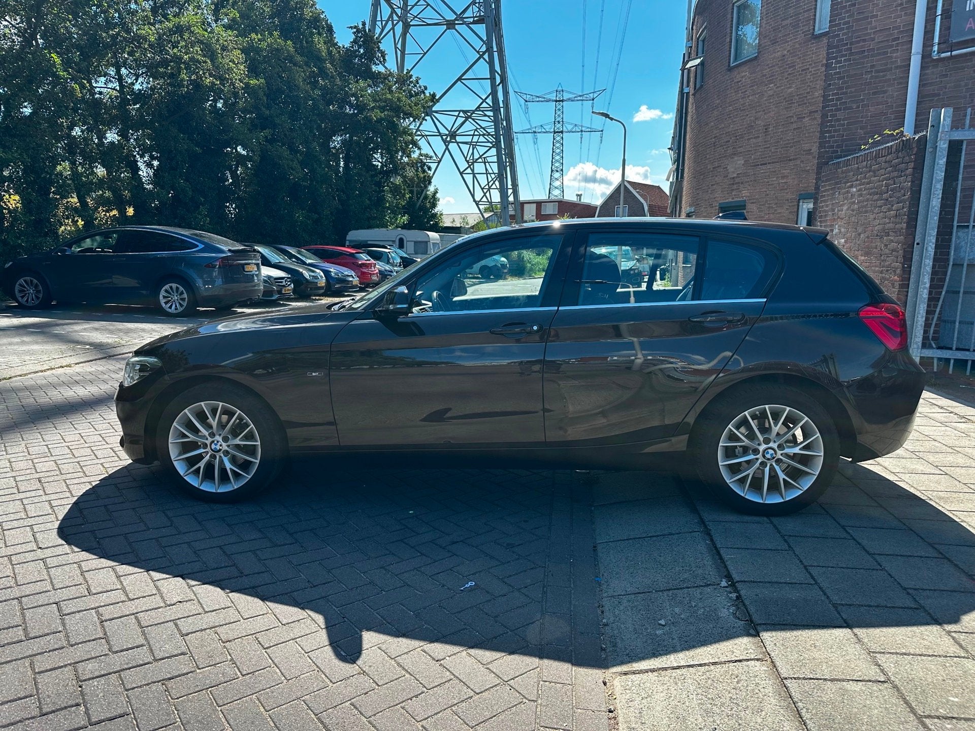 BMW 1-serie 118i Sport, Gebruikt, 4 cilinders, Bruin, Origineel Nederlands