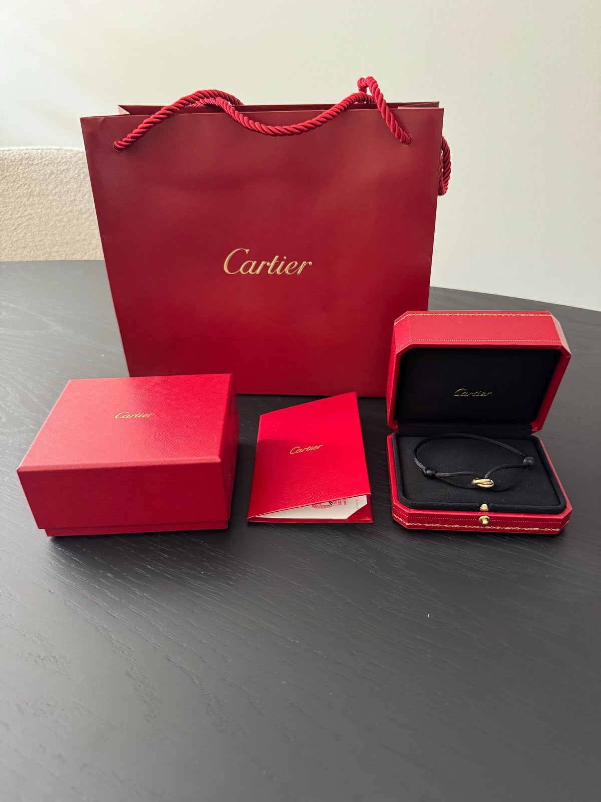 Cartier Trinity Armband - Zo goed als nieuw, Ophalen, Zo goed als nieuw, Zwart, Goud