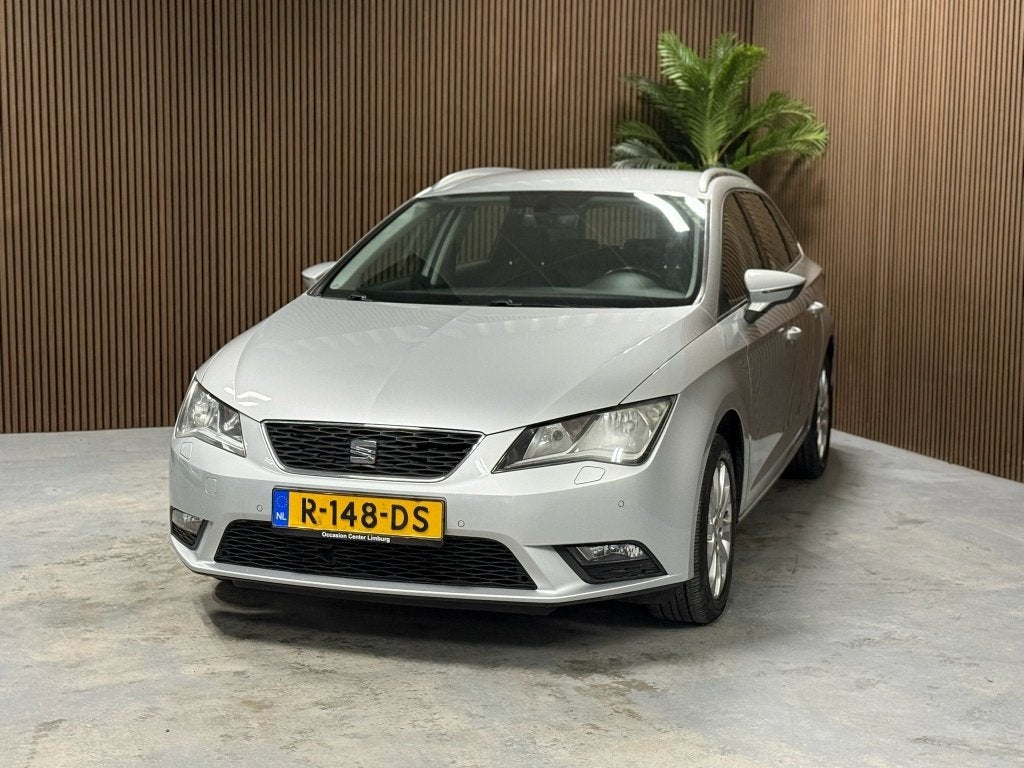 SEAT Leon ST 1.2 TSI Style (bj 2017, automaat), Auto's, Gebruikt, Euro 6, 4 cilinders, Automatische klimaatregeling