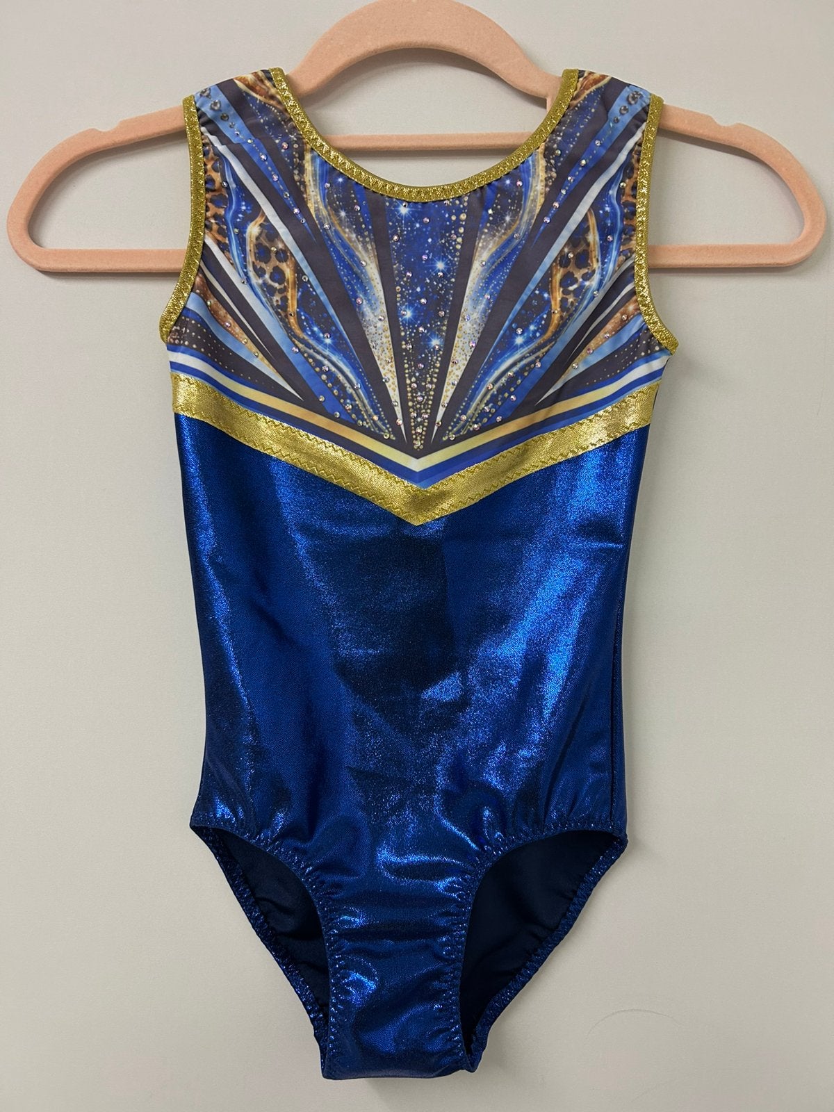 Nieuw turnpakje maat 122 blauw goud glitter, Kleiner dan kindermaat 122, Ophalen of Verzenden, Zo goed als nieuw, Turnpak(je)