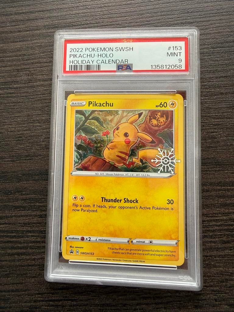 Pikachu Holo Holiday Calendar SWSH153 PSA 9 MINT, Ophalen of Verzenden, Nieuw, Losse kaart, Foil
